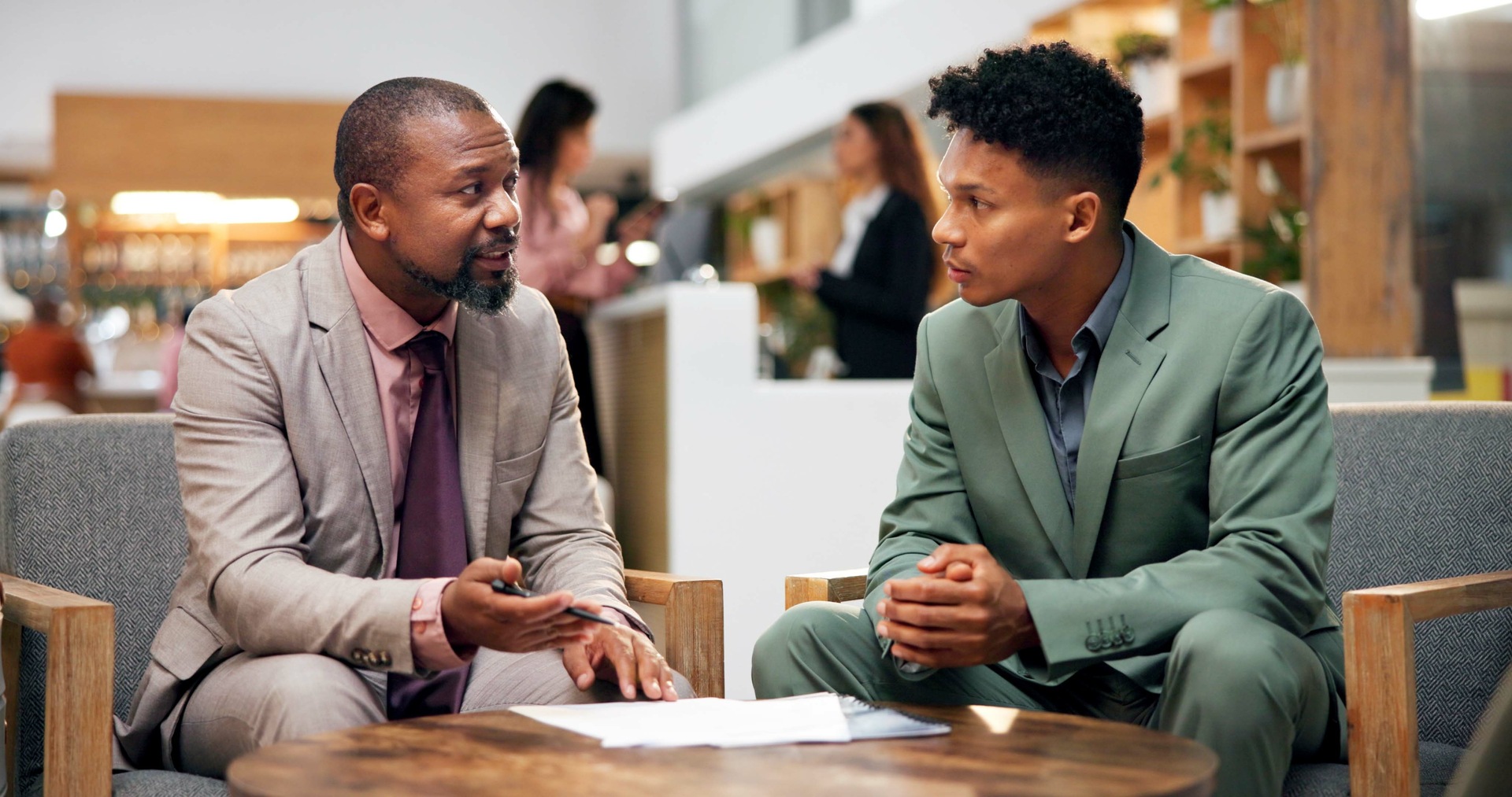 medium-vecteezy_documents-hotel-lobby-and-business-men-with-planning_77962712_medium